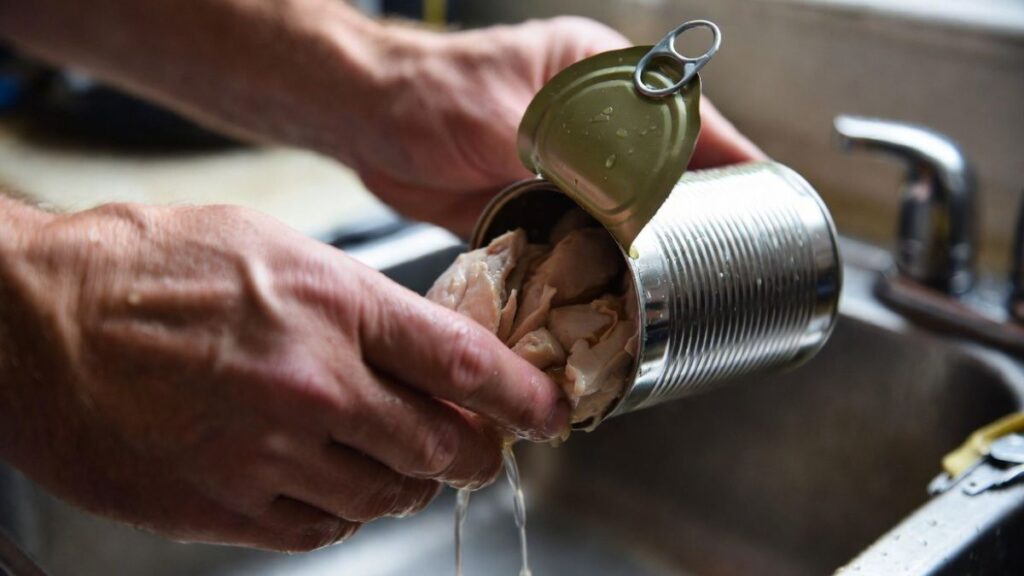 Draining canned chicken before mixing