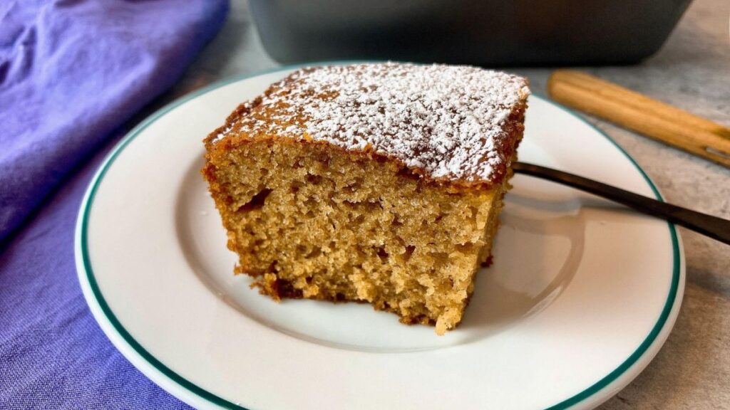 Easy applesauce cake recipe with a moist cinnamon-spiced crumb
