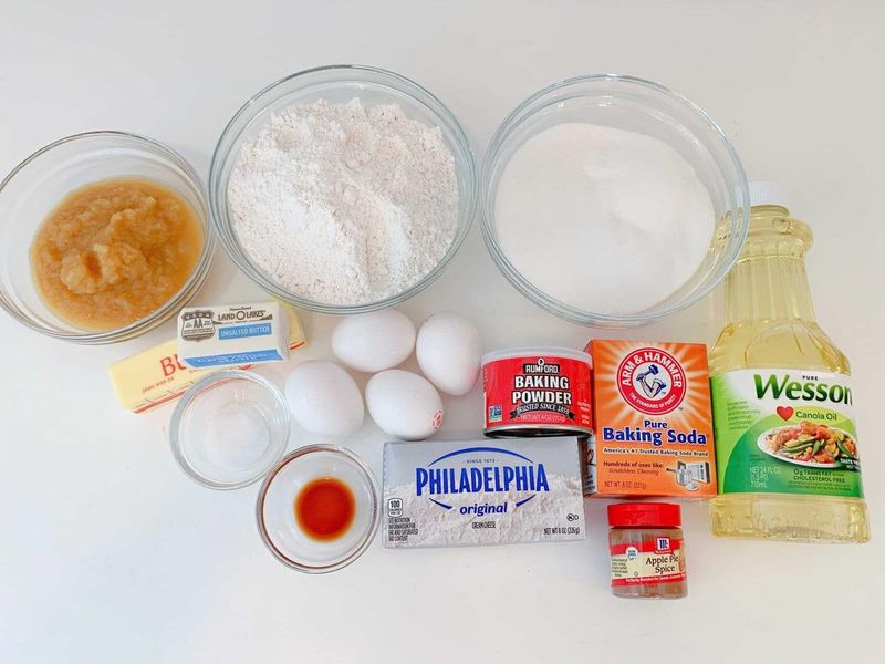 Flour and ground spices whisked together in a glass bowl