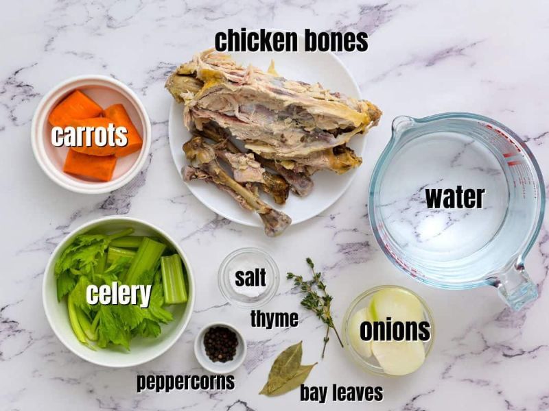 Chicken bones, carrots, celery, onion, garlic, and fresh herbs for stock